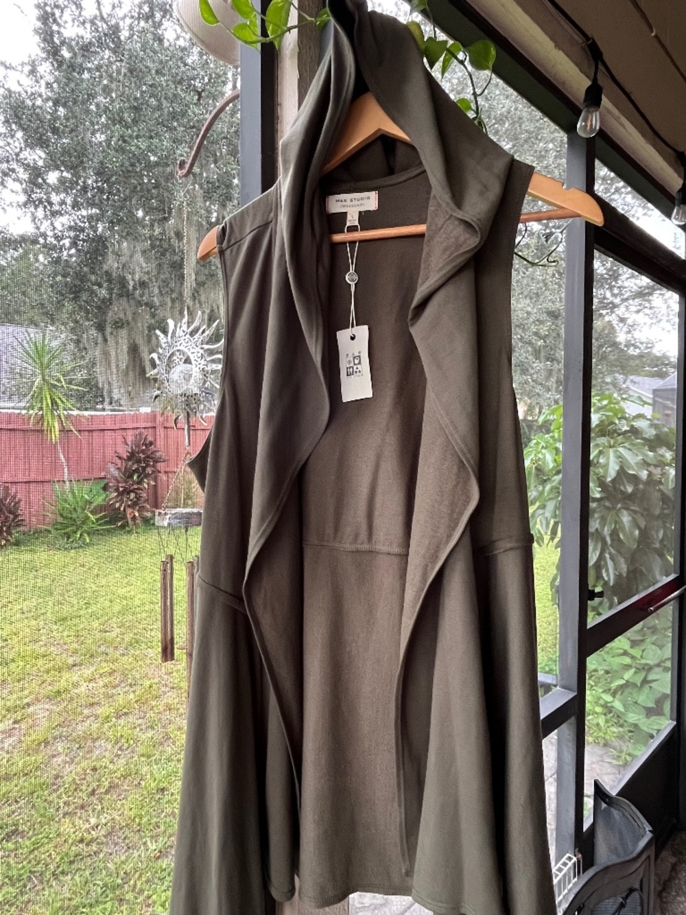 Max Studio olive green sleeveless draped cardigan vest with an attached hood